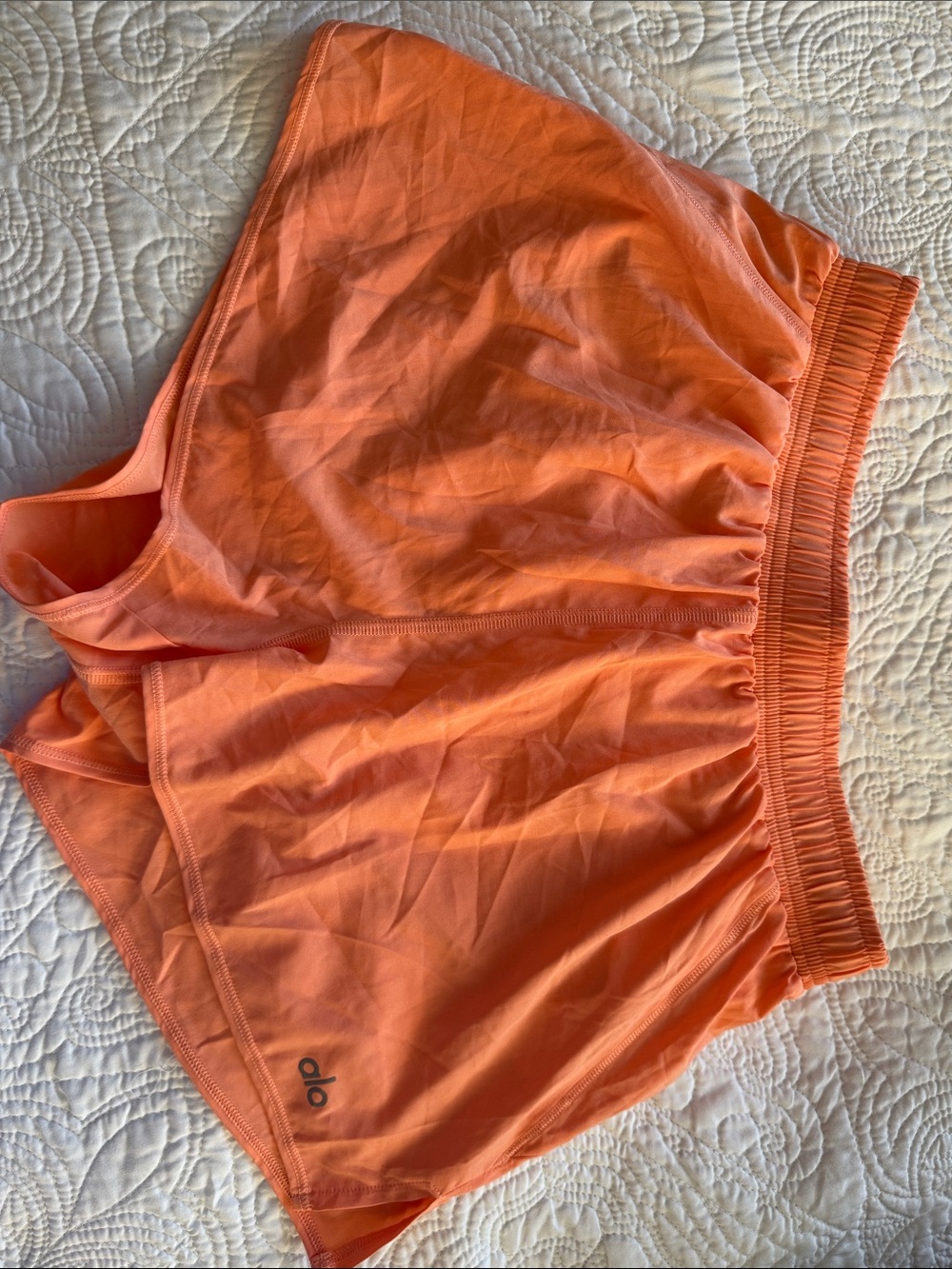 ALO Yoga Women’s stride short- cantaloupe